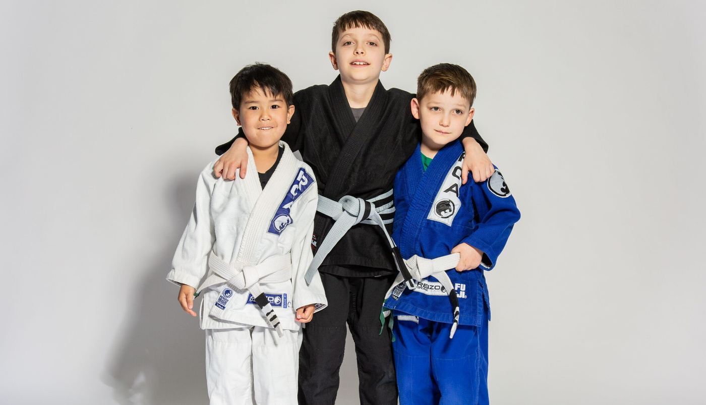 Renzo Gracie Naples kids showing their belts
