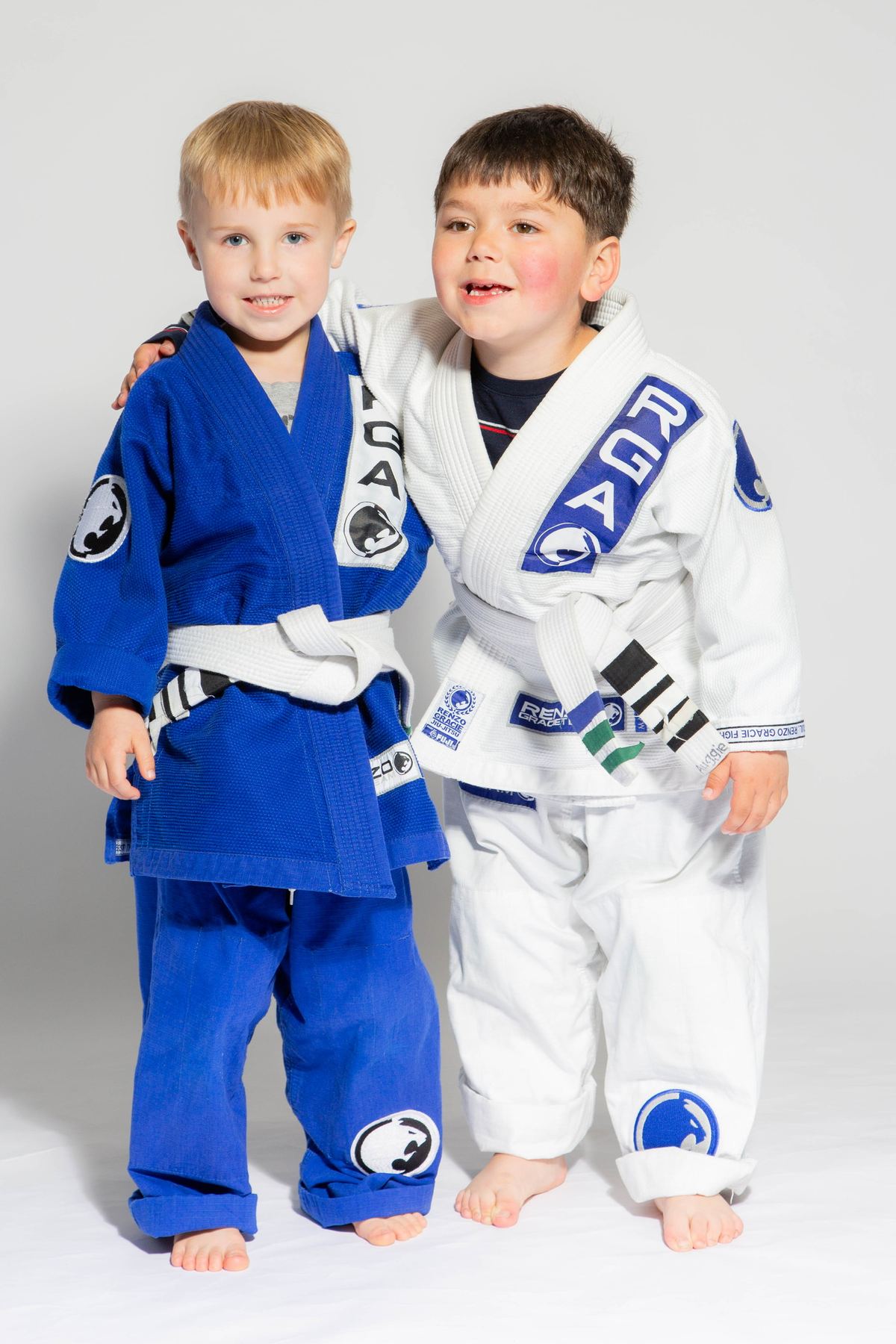Two Renzo Gracie Naples kids students in blue and white gis