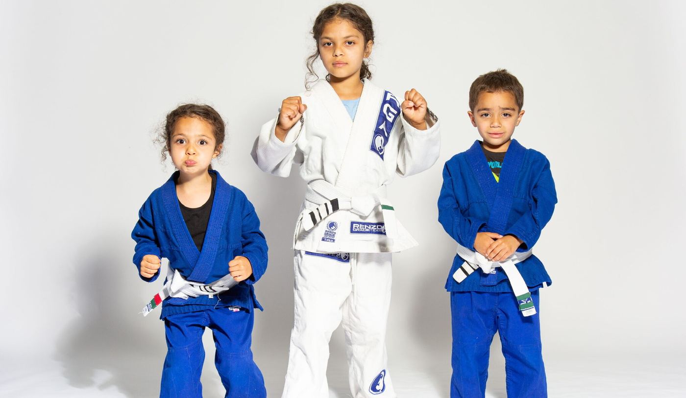 Three young Renzo Gracie Naples students in their gis